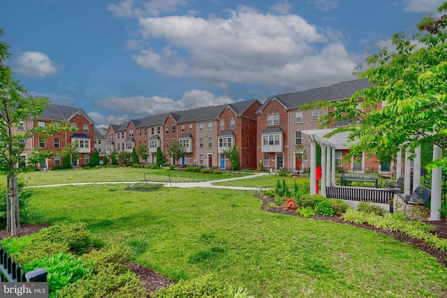 888 S Macon St, Baltimore, MD 21224 - view of home's community with a residential view and a lawn