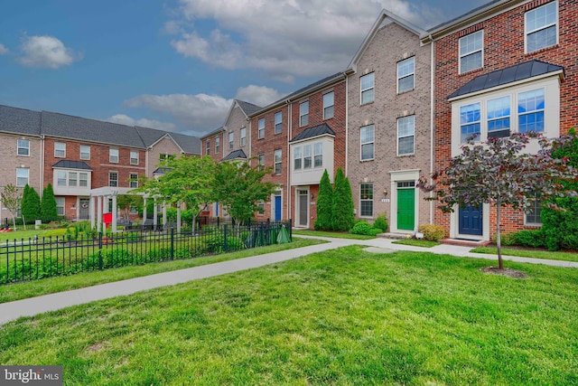 888 S Macon St, Baltimore, MD 21224 - view of front facade with brick siding and a residential view