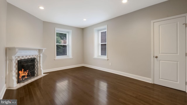 7804 Ardleigh St, Philadelphia, PA 19118 - unfurnished living room featuring a fireplace with flush hearth, wood finished floors, baseboards, and recessed lighting