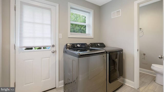 7804 Ardleigh St, Philadelphia, PA 19118 - washroom with washing machine and clothes dryer and baseboards
