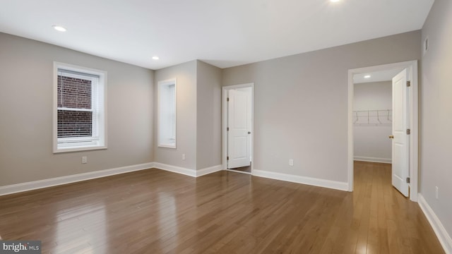7804 Ardleigh St, Philadelphia, PA 19118 - unfurnished bedroom featuring a spacious closet, wood finished floors, baseboards, recessed lighting, and a closet