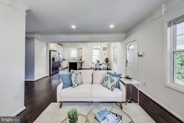 3404 Shepherd St, Mount Rainier, MD 20712 - living area featuring ornamental molding, dark wood finished floors, plenty of natural light, baseboards, and recessed lighting