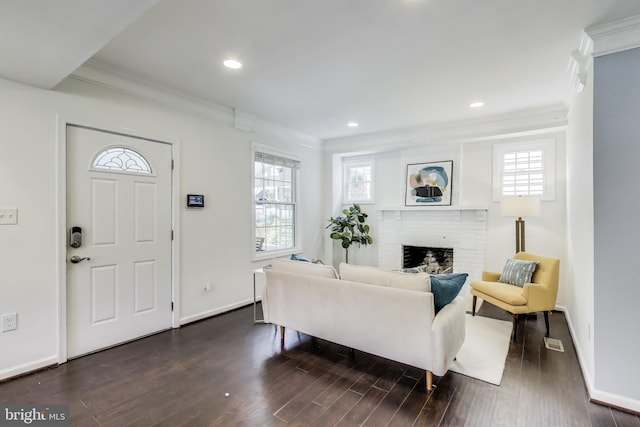 3404 Shepherd St, Mount Rainier, MD 20712 - living area featuring crown molding, a fireplace, dark wood finished floors, baseboards, and recessed lighting