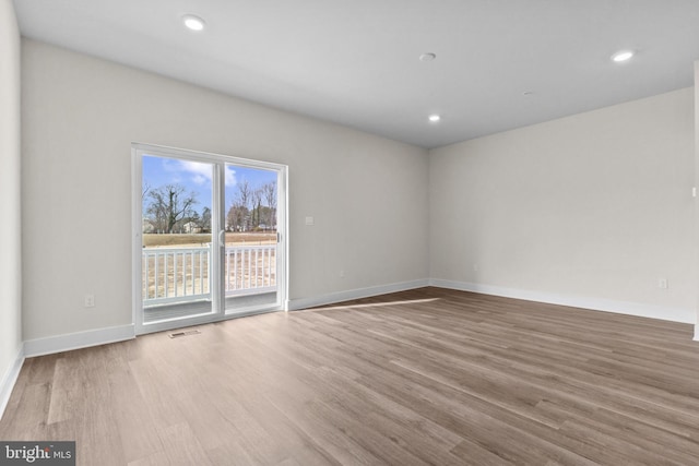 10604 Meridian Hill Way, Upper Marlboro, MD 20772 - empty room with wood finished floors, baseboards, and recessed lighting