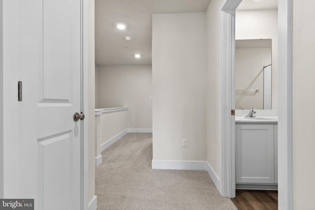 10604 Meridian Hill Way, Upper Marlboro, MD 20772 - corridor with a sink, baseboards, recessed lighting, and carpet