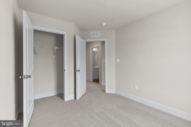 10604 Meridian Hill Way, Upper Marlboro, MD 20772 - unfurnished bedroom featuring light colored carpet, baseboards, and a closet