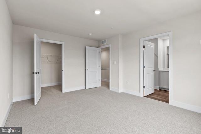 10604 Meridian Hill Way, Upper Marlboro, MD 20772 - unfurnished bedroom featuring carpet floors, baseboards, a spacious closet, and a closet
