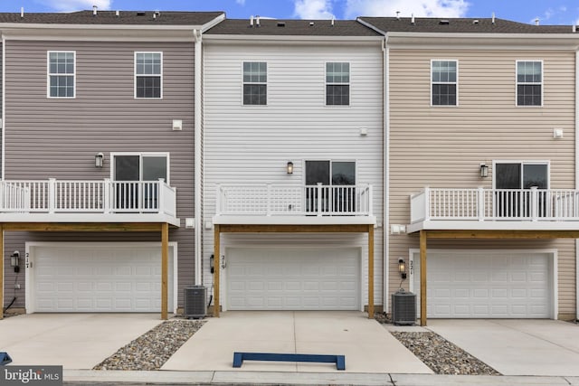 10604 Meridian Hill Way, Upper Marlboro, MD 20772 - back of property featuring a garage, driveway, and cooling unit