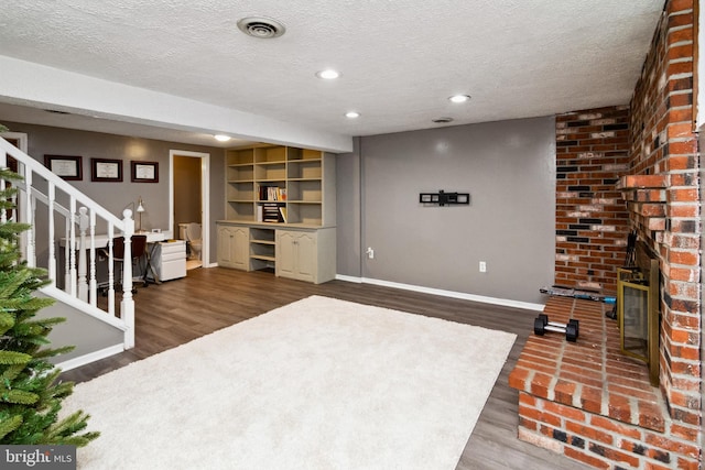 10 Bantry Ct, Baltimore, MD 21237 - living room featuring baseboards, dark wood-style flooring, stairway, a textured ceiling, and recessed lighting