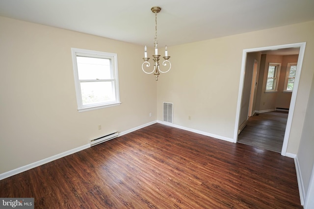 1206 Orchard Cir, Salisbury, MD 21801 - spare room featuring a baseboard heating unit, a chandelier, healthy amount of natural light, and dark wood finished floors