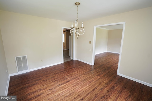 1206 Orchard Cir, Salisbury, MD 21801 - spare room featuring a chandelier, wood finished floors, and baseboards