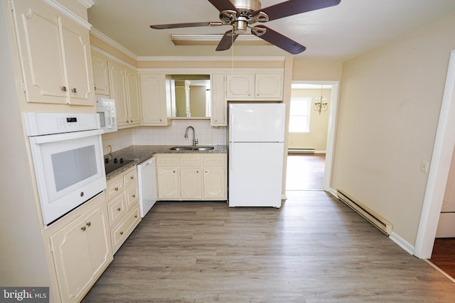 1206 Orchard Cir, Salisbury, MD 21801 - kitchen featuring white appliances, baseboard heating, a sink, and backsplash
