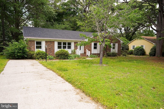 1206 Orchard Cir, Salisbury, MD 21801 - single story home featuring brick siding, a front yard, and entry steps