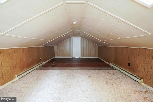 1206 Orchard Cir, Salisbury, MD 21801 - bonus room featuring baseboard heating, a baseboard heating unit, wooden walls, vaulted ceiling, and carpet flooring