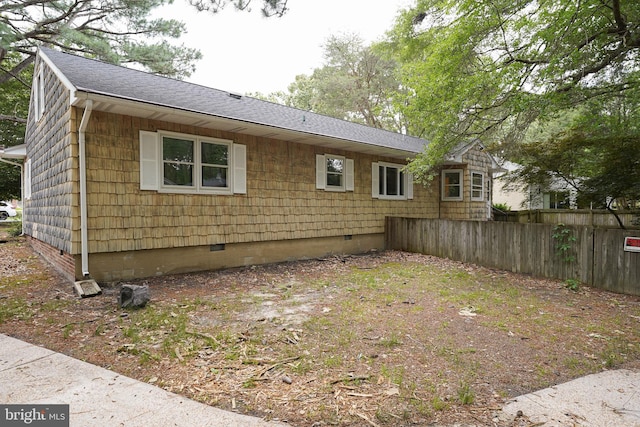 1206 Orchard Cir, Salisbury, MD 21801 - view of property exterior featuring crawl space and a shingled roof
