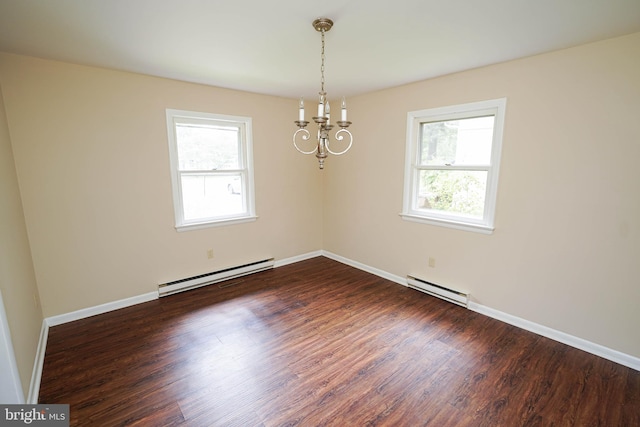 1206 Orchard Cir, Salisbury, MD 21801 - spare room featuring baseboard heating, plenty of natural light, and a chandelier