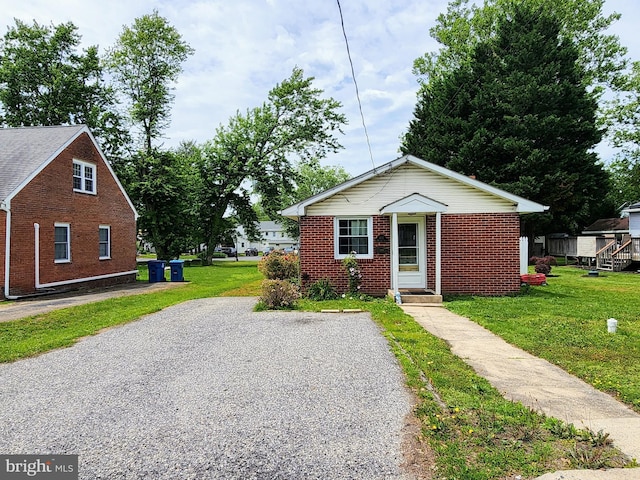 105 S Mauldin Ave S, North East, MD 21901 - bungalow-style house with brick siding and a front lawn