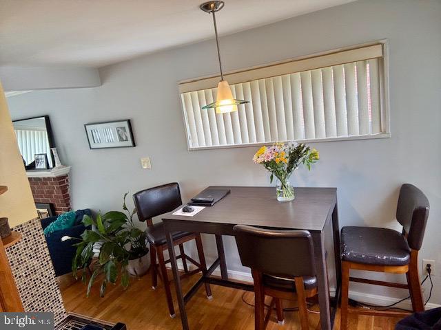 4116 Ellis St, Capitol Heights, MD 20743 - dining area with wood finished floors and a desk