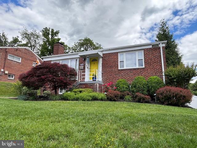 4116 Ellis St, Capitol Heights, MD 20743 - ranch-style home featuring a chimney, a front lawn, and brick siding