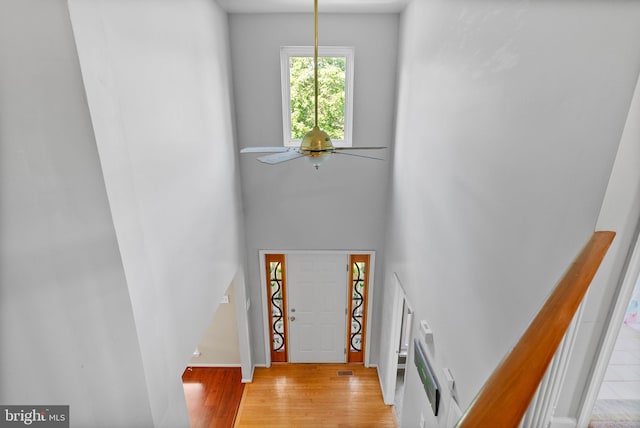 53 Pebble Beach Ln, Pottstown, PA 19464 - foyer with a ceiling fan, light wood finished floors, baseboards, and a high ceiling
