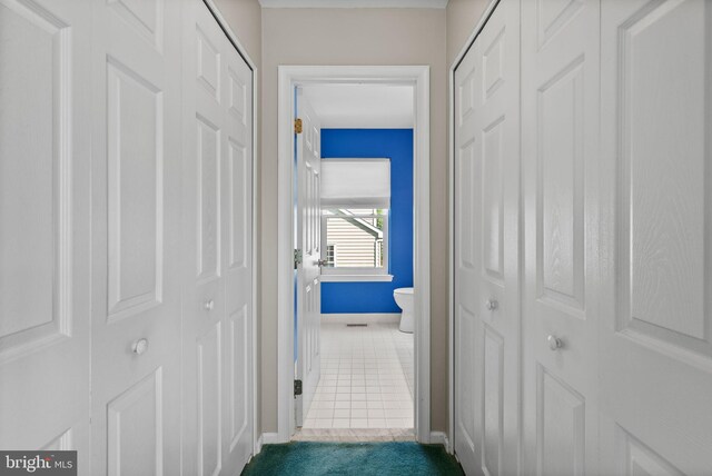 53 Pebble Beach Ln, Pottstown, PA 19464 - hallway with baseboards and tile patterned floors