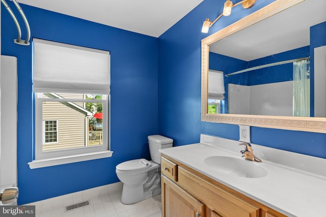 53 Pebble Beach Ln, Pottstown, PA 19464 - full bath featuring toilet, a shower with shower curtain, vanity, and tile patterned flooring