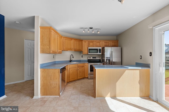 53 Pebble Beach Ln, Pottstown, PA 19464 - kitchen with stainless steel appliances, a sink, light tile patterned floors, and light countertops