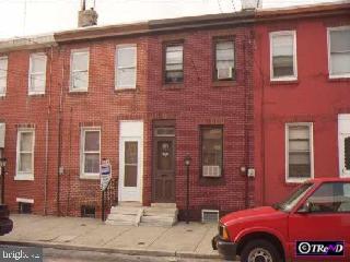 2312 Memphis St, Philadelphia, PA 19125 - multi unit property featuring brick siding and a chimney