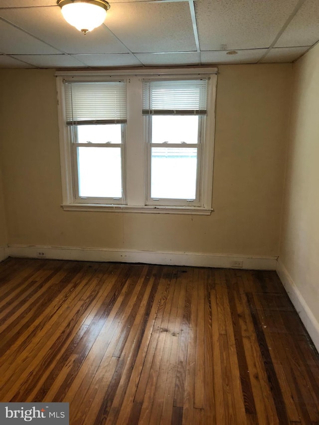 2312 Memphis St, Philadelphia, PA 19125 - unfurnished room featuring a paneled ceiling, dark wood-style flooring, and baseboards