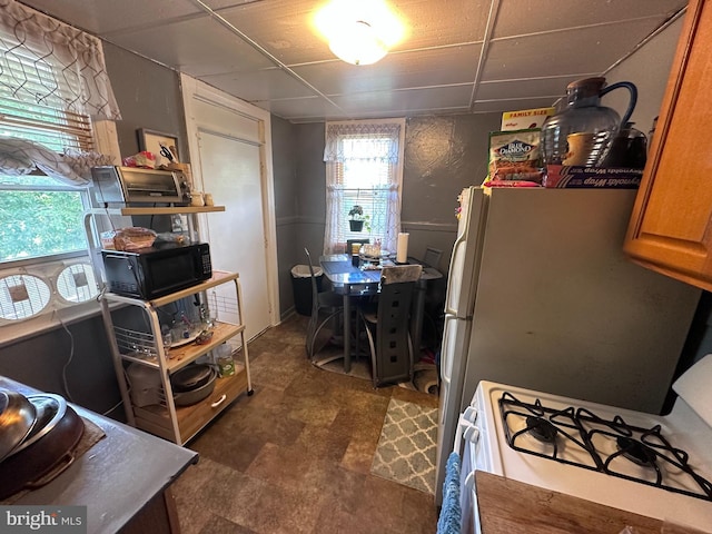 202 N Penn St, York, PA 17401 - kitchen featuring white range with gas cooktop and a desk