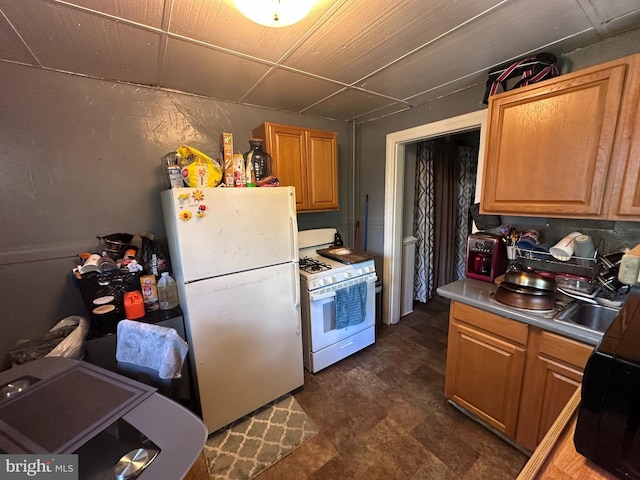 202 N Penn St, York, PA 17401 - kitchen featuring white appliances and a sink