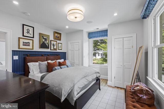 6200 Broad Branch Rd NW, Washington, DC 20015 - bedroom with recessed lighting, light wood-type flooring, and two closets