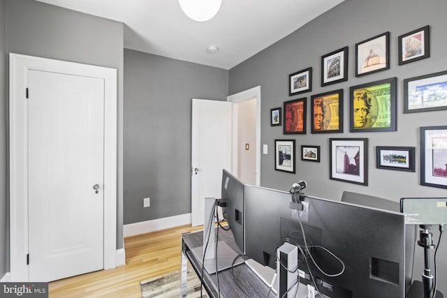 6200 Broad Branch Rd NW, Washington, DC 20015 - miscellaneous room featuring light wood-style floors, a desk, and baseboards