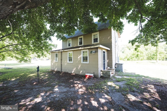 2570 Hickman Ln, Nanticoke, MD 21840 - rear view of property featuring roof with shingles