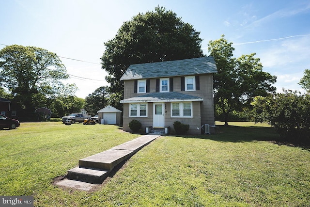 2570 Hickman Ln, Nanticoke, MD 21840 - view of front of property featuring a front lawn, a garage, and central air condition unit