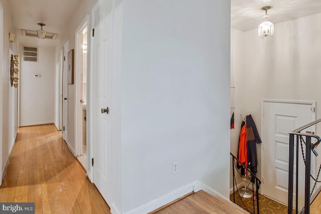 9803 Luke Ct, Upper Marlboro, MD 20772 - hallway featuring light wood-style floors and baseboards