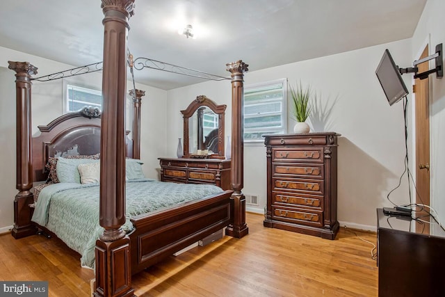 9803 Luke Ct, Upper Marlboro, MD 20772 - bedroom featuring light wood-style flooring and baseboards