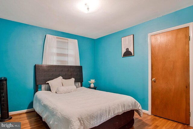 9803 Luke Ct, Upper Marlboro, MD 20772 - bedroom with wood finished floors and baseboards