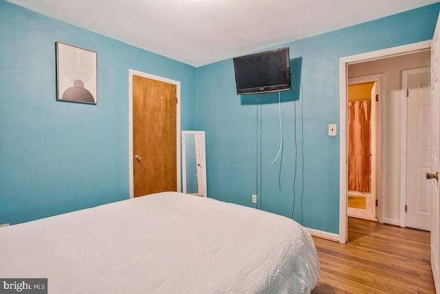 9803 Luke Ct, Upper Marlboro, MD 20772 - bedroom featuring wood finished floors and baseboards