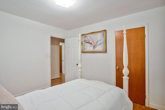 9803 Luke Ct, Upper Marlboro, MD 20772 - bedroom featuring wood finished floors and baseboards