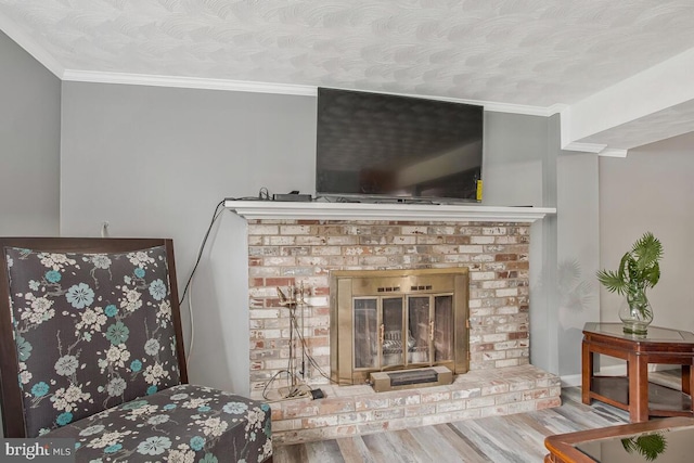 9803 Luke Ct, Upper Marlboro, MD 20772 - detailed view of wood finished floors, a brick fireplace, and crown molding