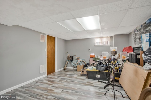 9803 Luke Ct, Upper Marlboro, MD 20772 - basement with a paneled ceiling and wood finished floors