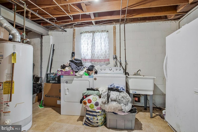 9803 Luke Ct, Upper Marlboro, MD 20772 - below grade area with water heater, independent washer and dryer, freestanding refrigerator, and tile patterned floors