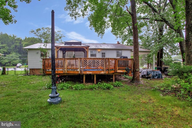 9803 Luke Ct, Upper Marlboro, MD 20772 - back of property with a gazebo, a wooden deck, and a lawn