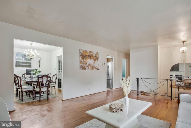 9803 Luke Ct, Upper Marlboro, MD 20772 - living area featuring a chandelier and wood finished floors