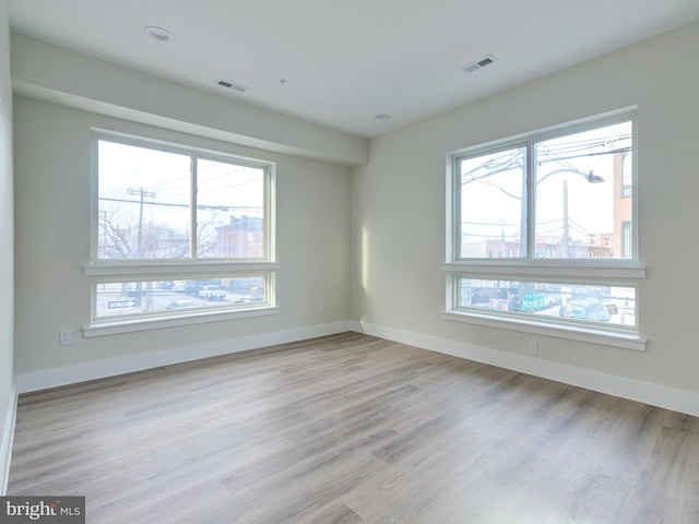 632 Moyer St, Philadelphia, PA 19125 - spare room with plenty of natural light, wood finished floors, and baseboards
