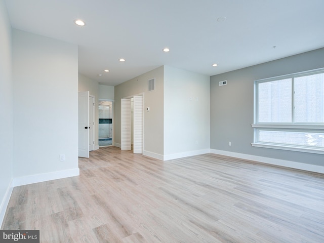 632 Moyer St, Philadelphia, PA 19125 - empty room with recessed lighting, light wood finished floors, and baseboards