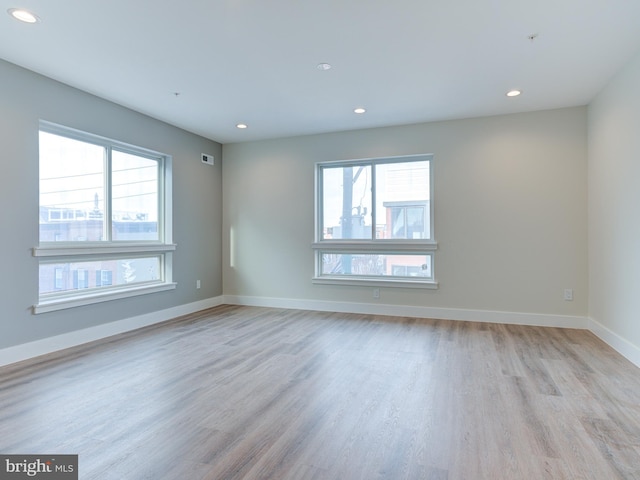 632 Moyer St, Philadelphia, PA 19125 - empty room with healthy amount of natural light, light wood-style floors, recessed lighting, and baseboards