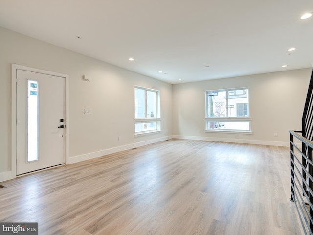 632 Moyer St, Philadelphia, PA 19125 - unfurnished living room featuring light wood finished floors, baseboards, and recessed lighting