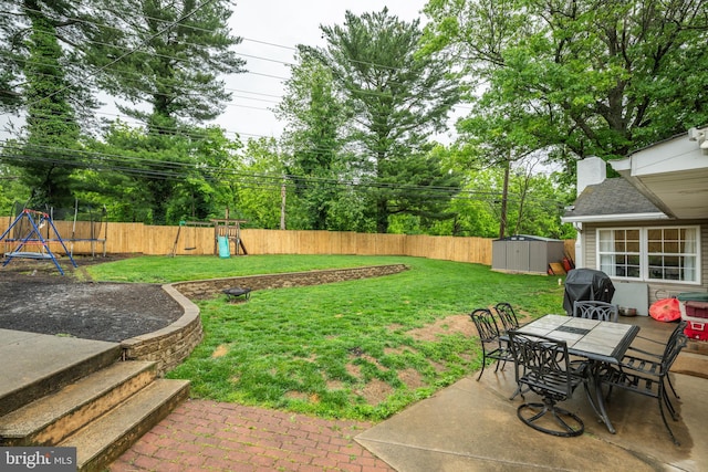 54 Camellia Rd, Levittown, PA 19057 - view of yard with a playground, a patio area, and outdoor dining space